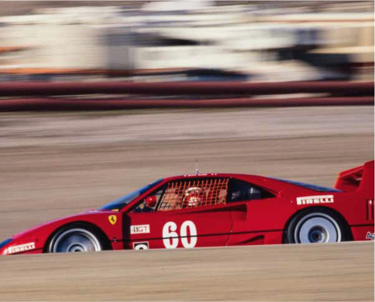 Ferrari F40 Competizione numero 60 rossa in azione su circuito americano